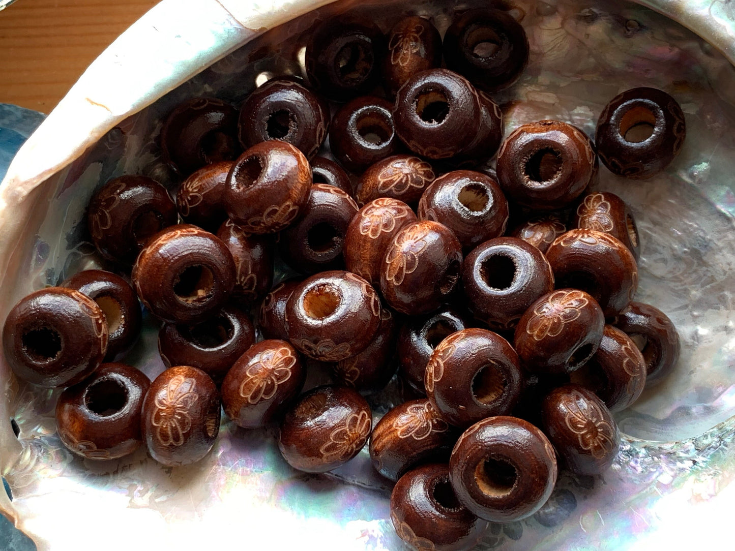 Deep brown wooden spacers rondelle beads from Bali etched flower design.15x10mm